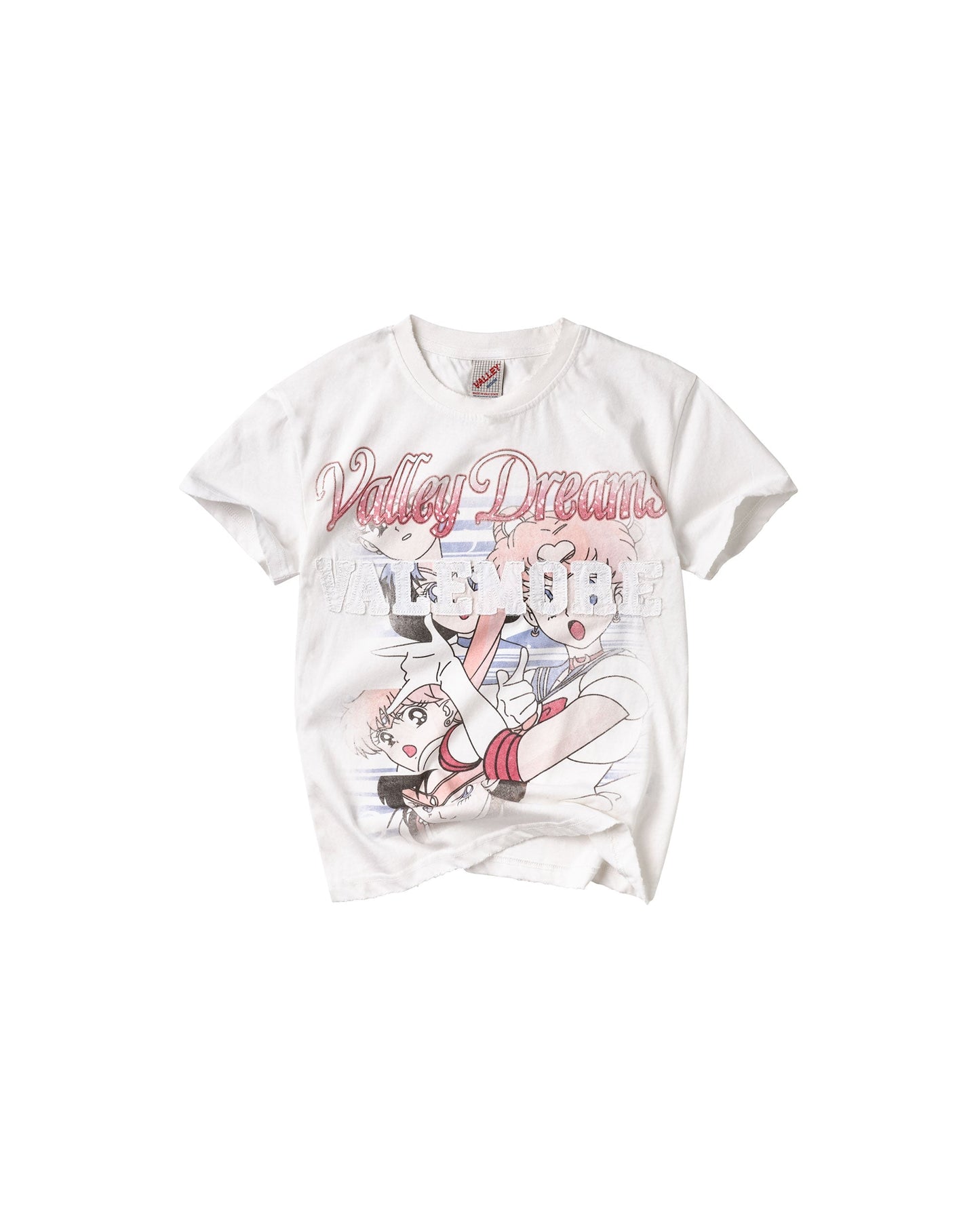 A white short-sleeve graphic t-shirt featuring a manga-style illustration of Sailor Moon and the text 'Valley Dreamers' in pink script across the chest.